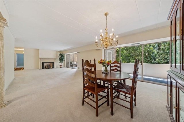 53 Highland Rd Unit 403-404, Bethel Park, PA 15102 - carpeted dining room featuring plenty of natural light, a chandelier, and a fireplace