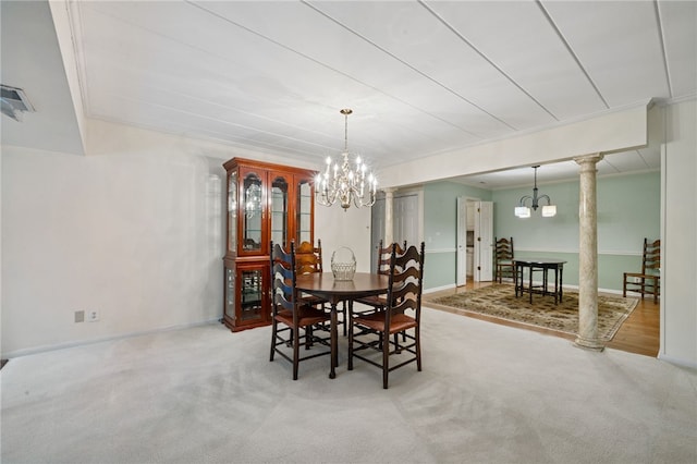 53 Highland Rd Unit 403-404, Bethel Park, PA 15102 - dining area featuring a chandelier and carpet floors