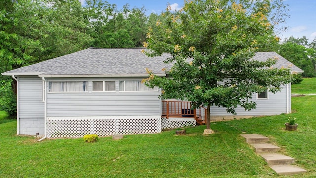 1021 Beechnut St, West Deer, PA 15084 - view of home's exterior featuring a deck, a yard, and roof with shingles