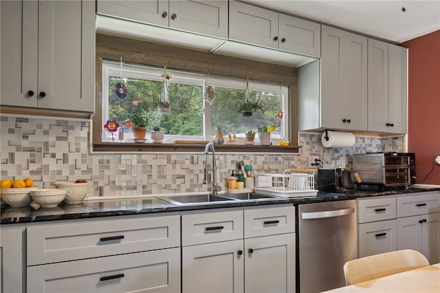 1021 Beechnut St, West Deer, PA 15084 - kitchen featuring dishwasher, tasteful backsplash, healthy amount of natural light, and dark stone counters