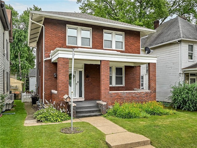 112 Fisk Ave, Avalon, PA 15202 - american foursquare style home with brick siding and a front yard