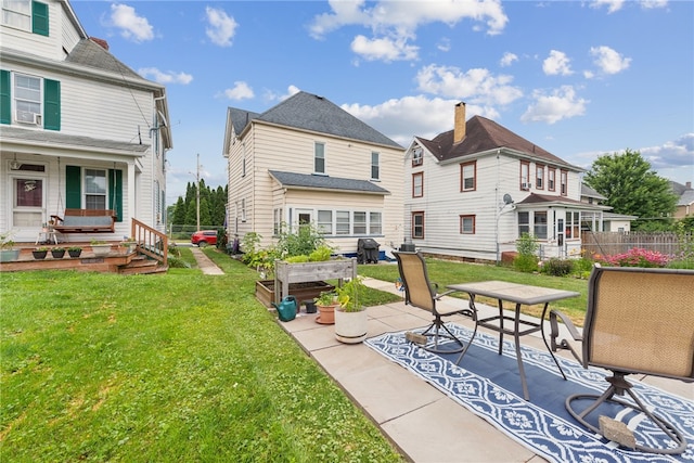 332 S Chestnut St, Scottdale, PA 15683 - back of property with a patio area