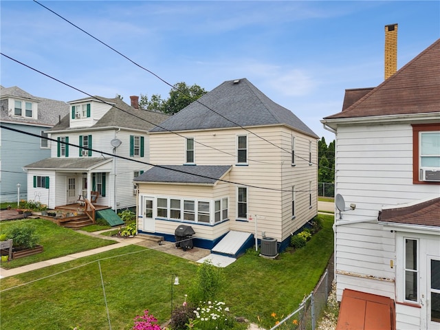 332 S Chestnut St, Scottdale, PA 15683 - back of house featuring cooling unit and a shingled roof