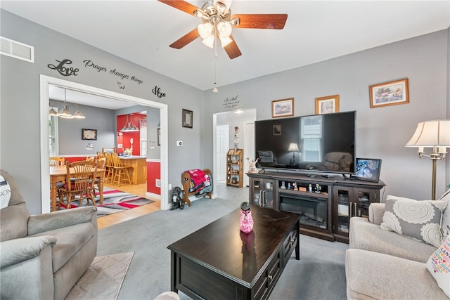 332 S Chestnut St, Scottdale, PA 15683 - carpeted living room with a ceiling fan