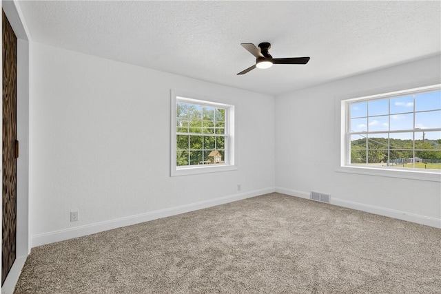 235 Telegraph Rd, Luzerne Twp, PA 15417 - carpeted spare room featuring a ceiling fan and a textured ceiling