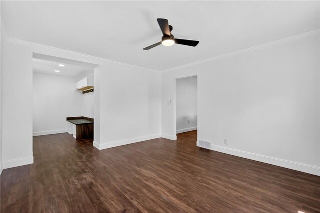 235 Telegraph Rd, Luzerne Twp, PA 15417 - spare room with a ceiling fan, dark wood-style floors, and crown molding
