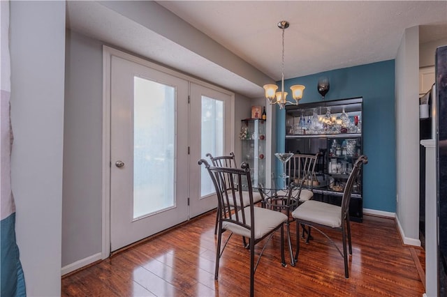 115 Westbrooke Ln, Findlay Twp, PA 15108 - dining space with a chandelier and wood finished floors
