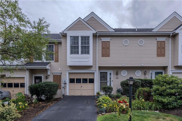 115 Westbrooke Ln, Findlay Twp, PA 15108 - townhome / multi-family property featuring a garage and driveway