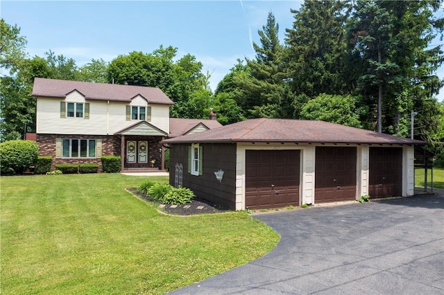 8410 Windsor Beach Ct, Harborcreek Twp, PA 16511 - view of front of home featuring a detached garage and a front yard