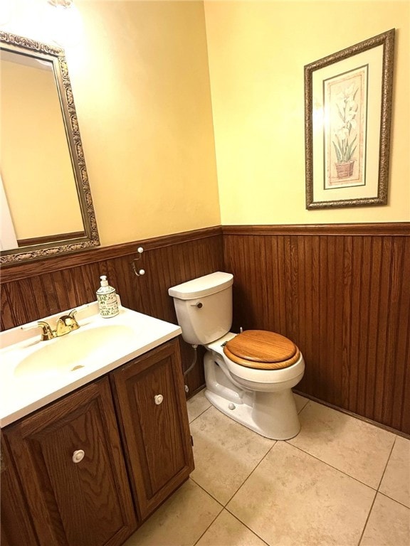 8410 Windsor Beach Ct, Harborcreek Twp, PA 16511 - bathroom featuring a wainscoted wall, vanity, and tile patterned flooring
