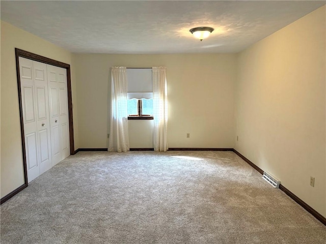 8410 Windsor Beach Ct, Harborcreek Twp, PA 16511 - unfurnished bedroom featuring light colored carpet and a closet