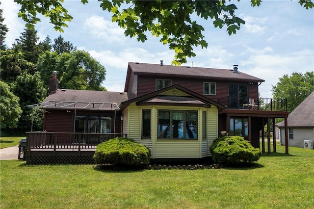 8410 Windsor Beach Ct, Harborcreek Twp, PA 16511 - rear view of property featuring a deck, a yard, a shingled roof, and a chimney