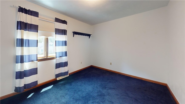 8410 Windsor Beach Ct, Harborcreek Twp, PA 16511 - spare room featuring dark carpet and baseboards