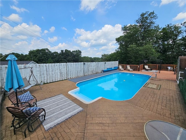323 Hoon Rd, Oakland Twp, PA 16001 - view of pool featuring a fenced backyard, a wooden deck, and view of scattered trees