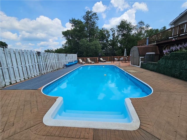 323 Hoon Rd, Oakland Twp, PA 16001 - view of swimming pool featuring a storage unit, a fenced backyard, and a patio