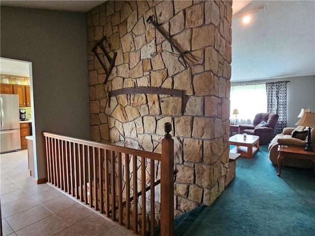 323 Hoon Rd, Oakland Twp, PA 16001 - hallway with an upstairs landing, light tile patterned floors, and light carpet