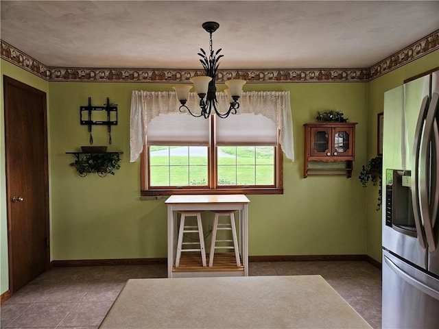 323 Hoon Rd, Oakland Twp, PA 16001 - dining room with a chandelier and tile patterned floors