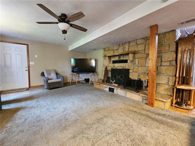323 Hoon Rd, Oakland Twp, PA 16001 - living area with carpet floors, ceiling fan, and a stone fireplace
