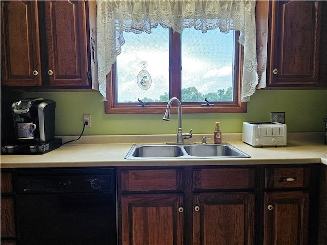 323 Hoon Rd, Oakland Twp, PA 16001 - kitchen featuring dishwasher, light countertops, and dark brown cabinets