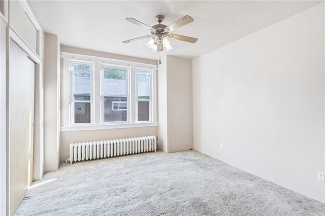 357 Keystone Dr, New Kensington, PA 15068 - carpeted spare room featuring radiator and ceiling fan