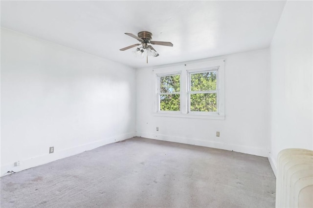 357 Keystone Dr, New Kensington, PA 15068 - carpeted spare room featuring a ceiling fan and radiator heating unit