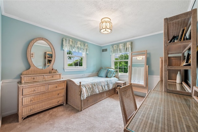 511 Brunswick Dr, Hempfield Twp, PA 15601 - bedroom with crown molding, carpet floors, and a textured ceiling