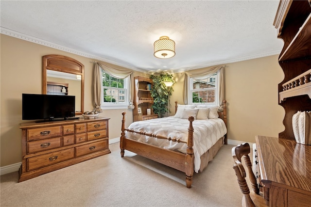 511 Brunswick Dr, Hempfield Twp, PA 15601 - bedroom with light carpet, a textured ceiling, and ornamental molding