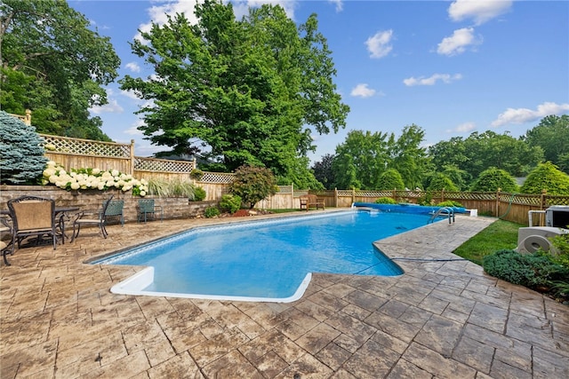 511 Brunswick Dr, Hempfield Twp, PA 15601 - view of swimming pool featuring a patio area and a fenced backyard