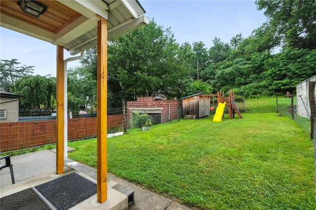 4329 Stanton Ave, Stanton Heights, PA 15201 - fenced backyard with a playground, a storage shed, and a patio area