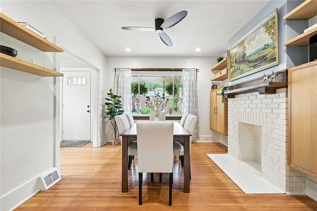 4329 Stanton Ave, Stanton Heights, PA 15201 - dining room featuring light wood finished floors, a ceiling fan, a brick fireplace, and recessed lighting
