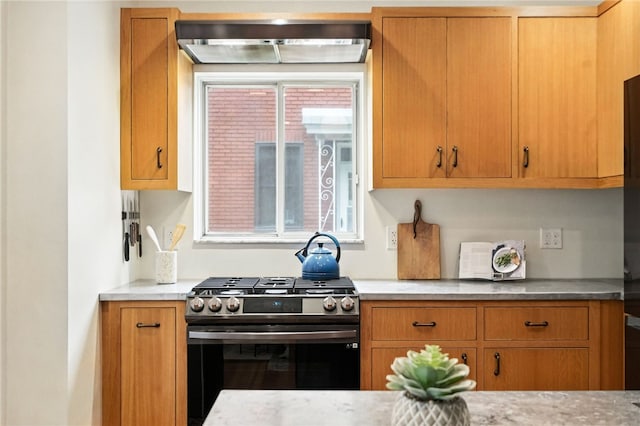 4329 Stanton Ave, Stanton Heights, PA 15201 - kitchen with stainless steel range with gas cooktop, brown cabinetry, and light stone countertops