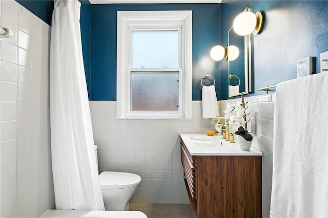 4329 Stanton Ave, Stanton Heights, PA 15201 - full bathroom with vanity, tile walls, a wainscoted wall, and curtained shower
