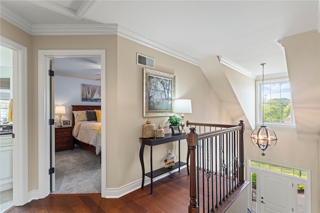 3111 Edelweiss Ct Ste 201, Adams Twp, PA 16046 - corridor with an upstairs landing, dark wood-style floors, a chandelier, and ornamental molding