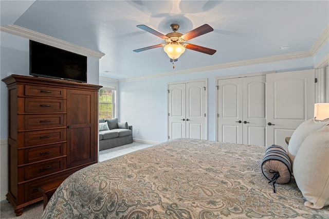 3111 Edelweiss Ct Ste 201, Adams Twp, PA 16046 - carpeted bedroom with multiple closets, ornamental molding, and ceiling fan