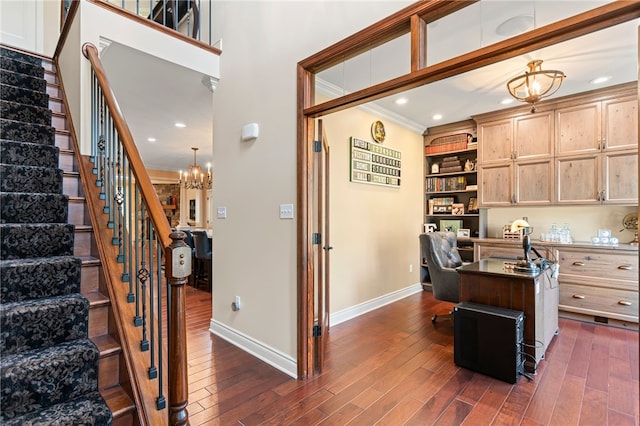 3111 Edelweiss Ct Ste 201, Adams Twp, PA 16046 - home office with a chandelier, dark wood-type flooring, and ornamental molding