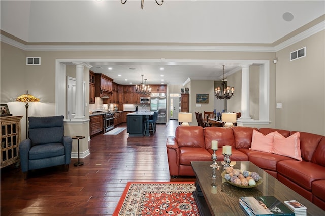 3111 Edelweiss Ct Ste 201, Adams Twp, PA 16046 - living room with a chandelier, ornate columns, dark wood-style flooring, ornamental molding, and recessed lighting