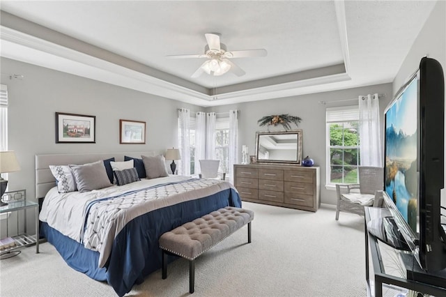 774 Norwegian Spruce Dr, Adams Twp, PA 16046 - bedroom with light carpet, a tray ceiling, and ceiling fan