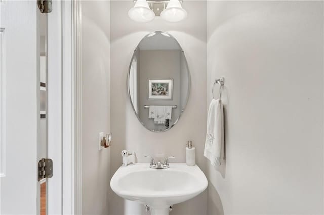 774 Norwegian Spruce Dr, Adams Twp, PA 16046 - bathroom with a sink and a chandelier