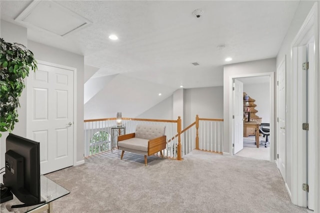 774 Norwegian Spruce Dr, Adams Twp, PA 16046 - living area featuring carpet floors, recessed lighting, and an upstairs landing