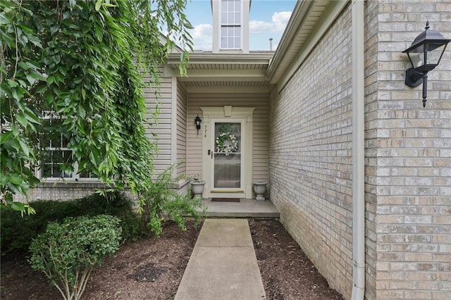 774 Norwegian Spruce Dr, Adams Twp, PA 16046 - property entrance featuring brick siding