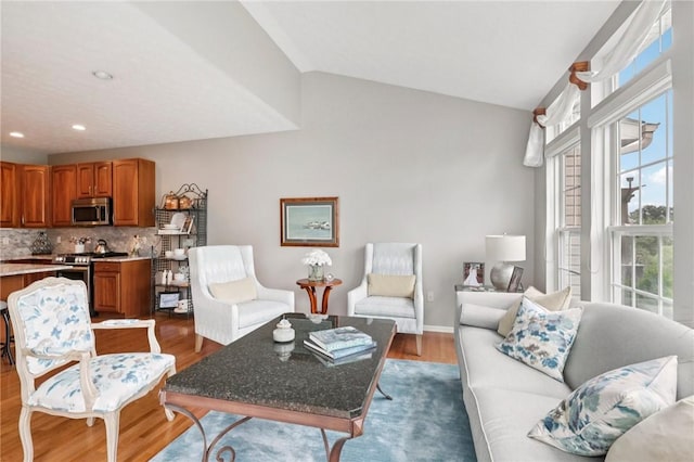 774 Norwegian Spruce Dr, Adams Twp, PA 16046 - living room featuring dark wood finished floors, lofted ceiling, and recessed lighting