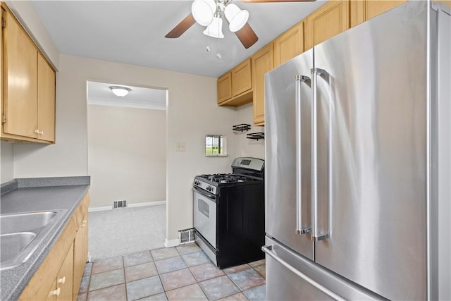 10 Ronald St, West Elizabeth, PA 15088 - kitchen featuring appliances with stainless steel finishes, ceiling fan, light brown cabinets, light colored carpet, and ornamental molding