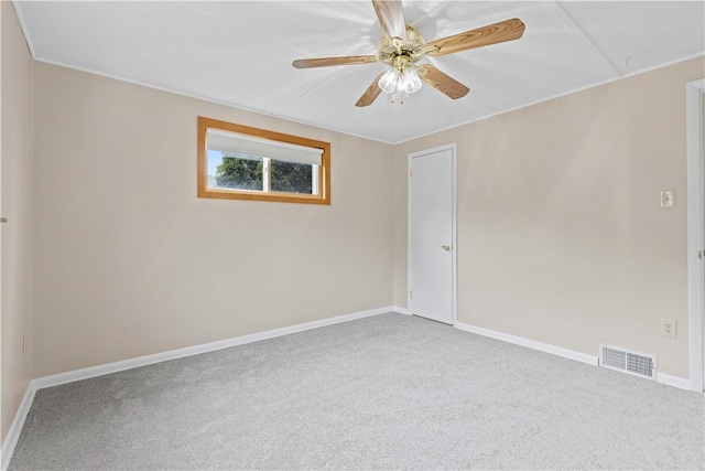 10 Ronald St, West Elizabeth, PA 15088 - spare room with carpet flooring, attic access, and a ceiling fan