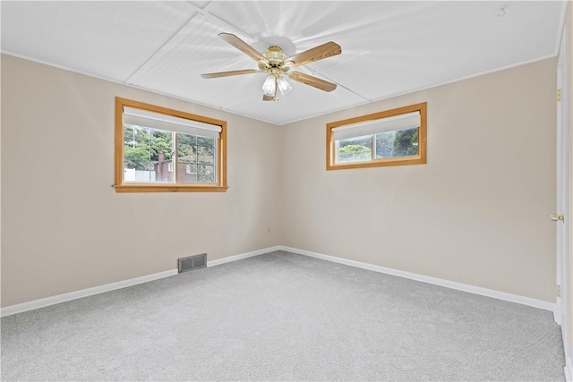 10 Ronald St, West Elizabeth, PA 15088 - carpeted spare room with plenty of natural light and a ceiling fan