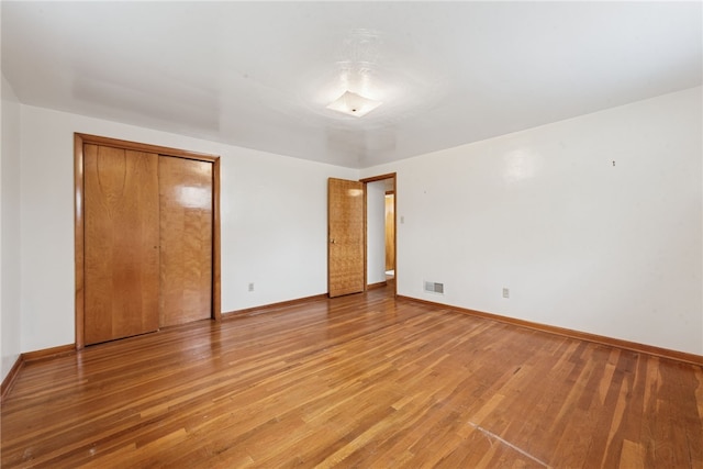 1920 Cheryl Dr, North Huntingdon, PA 15642 - unfurnished bedroom featuring light wood-type flooring and a closet