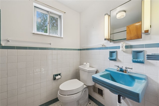 1920 Cheryl Dr, North Huntingdon, PA 15642 - bathroom with tile walls, tile patterned flooring, and wainscoting