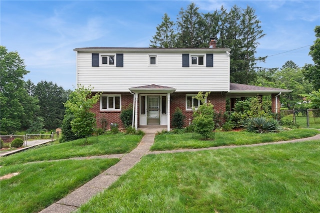 1920 Cheryl Dr, North Huntingdon, PA 15642 - view of front of home featuring a chimney and brick siding