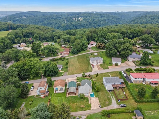 3914 38th St, Pulaski Twp, PA 15066 - aerial view of property and surrounding area featuring a heavily wooded area and nearby suburban area