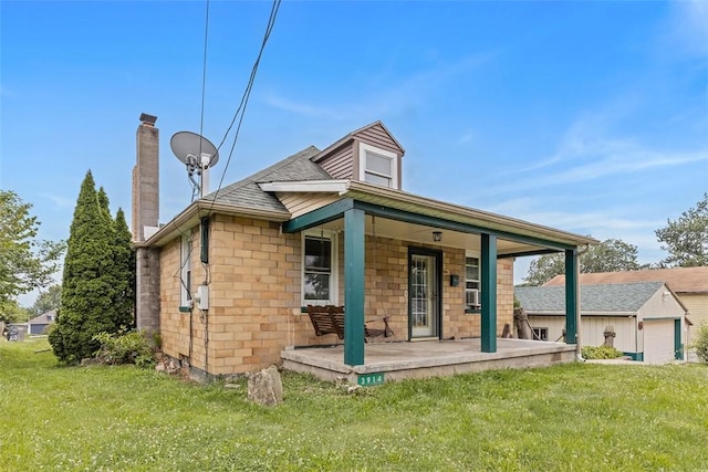 3914 38th St, Pulaski Twp, PA 15066 - view of front facade featuring a porch, a chimney, a front yard, and cooling unit