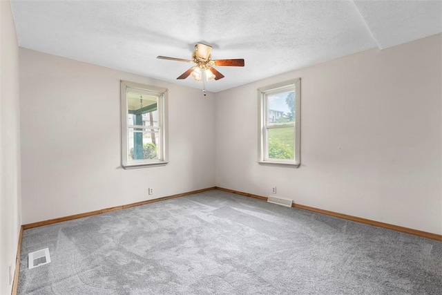 3914 38th St, Pulaski Twp, PA 15066 - empty room with a ceiling fan, carpet floors, and a textured ceiling